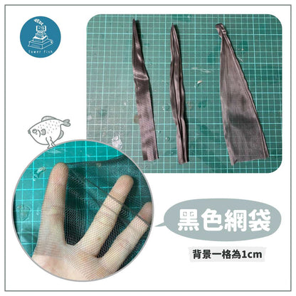 a close up of a person holding a pair of scissors 