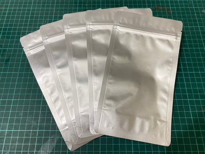 a piece of paper sitting on top of a piece of paper 