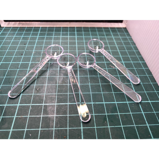 a pair of scissors sitting on a table 
